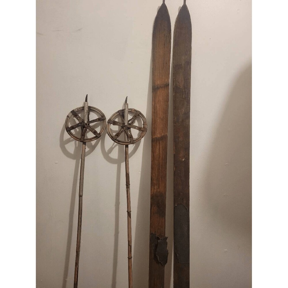 Antique Wooden‎ Downhill skis and ski poles.  Perfect for  Cabin or lodge decor